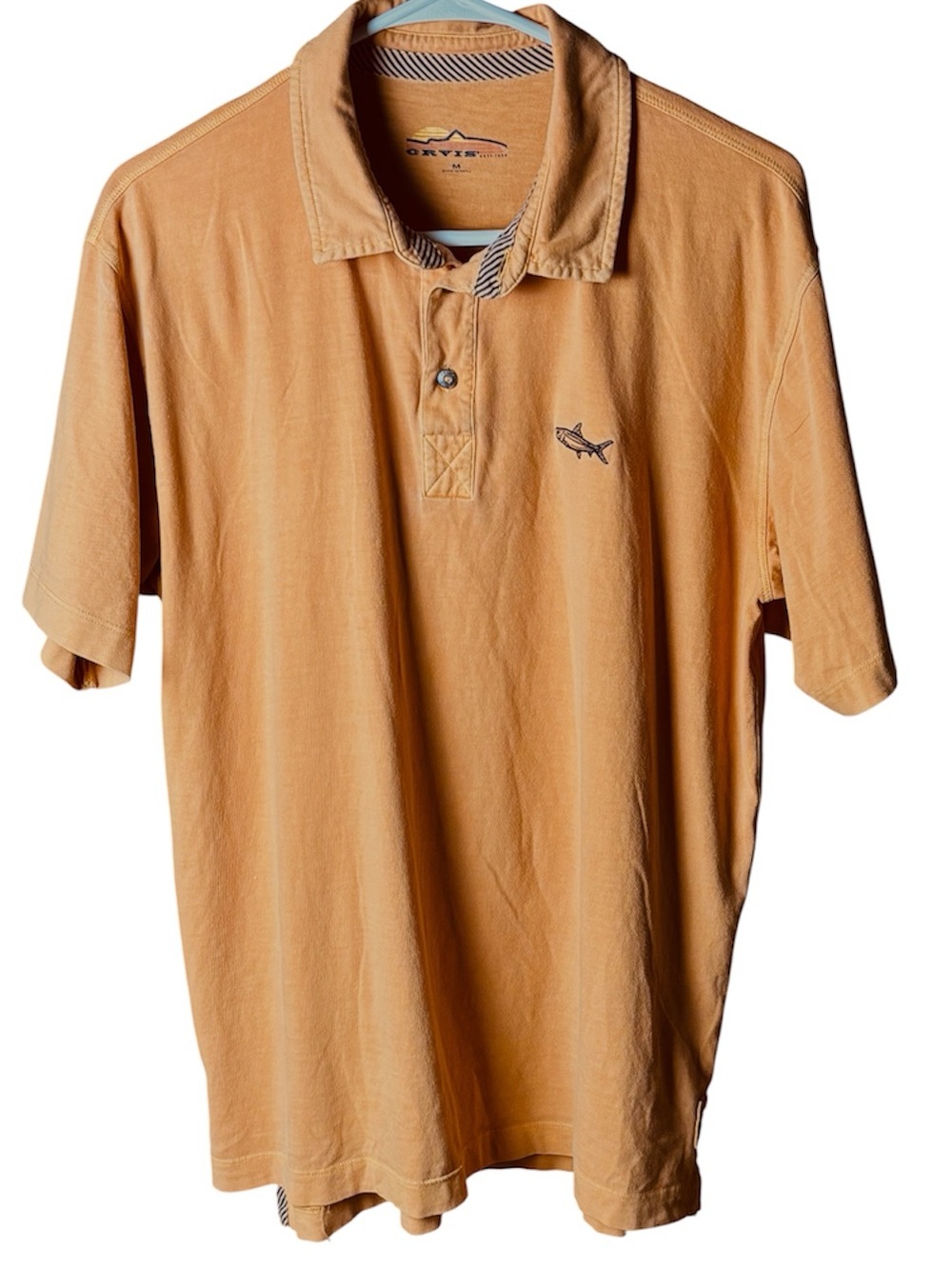 Men's medium short-sleeve orange-colored  polo shirt with fish logo.